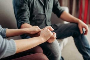 someone confronts a loved one they suspect is drinking too much about their potential alcohol addiction