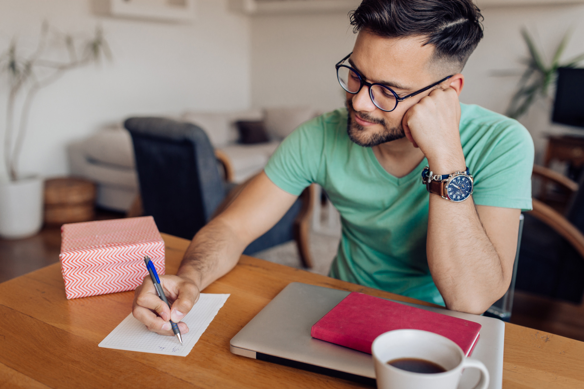 man writing a goodbye letter to addiction