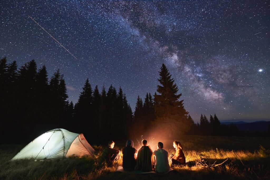 a group of men go camping to discuss sober bachelor party ideas