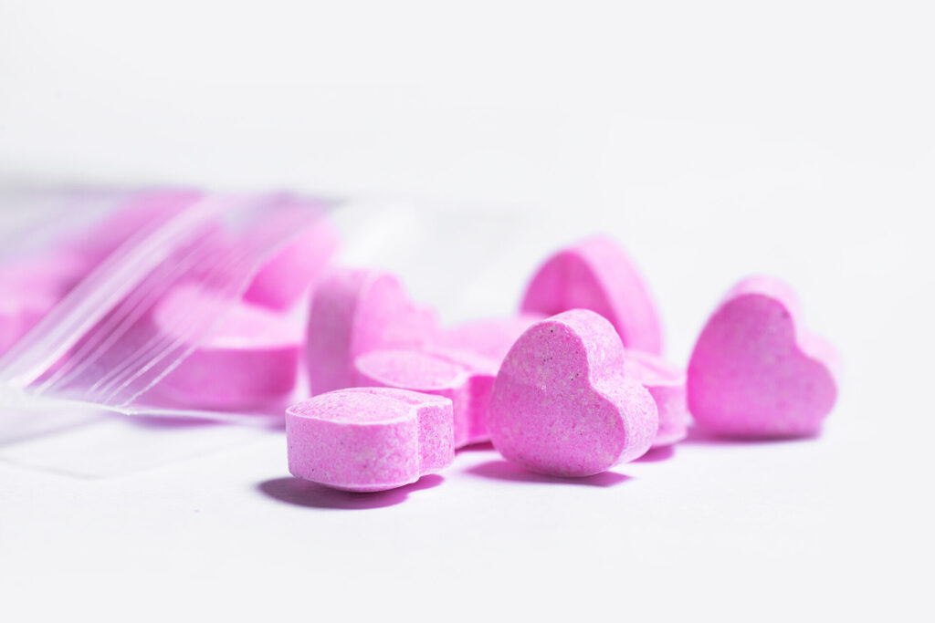 Ziplock bag and pink heart shaped pills