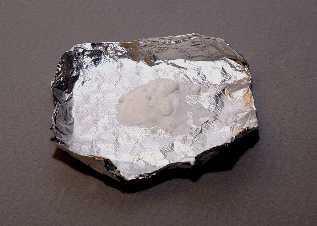 Powdered meth in a foil container
